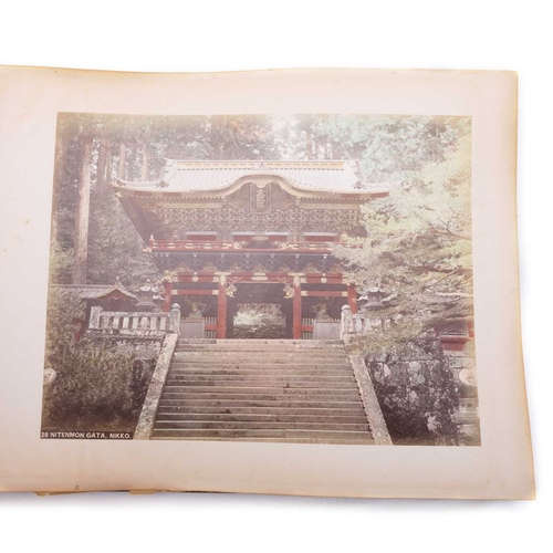 111 - AN EARLY 20TH CENTURY JAPANESE PHOTOGRAPH ALBUM circa 1900, enclosing coloured plates depicting name... 