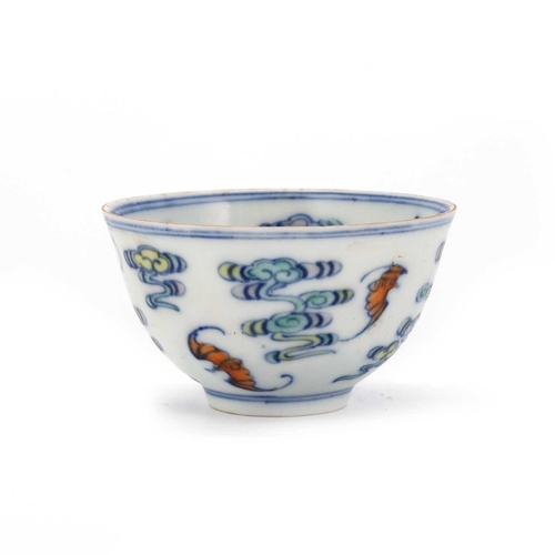 120 - A CHINESE DOUCAI TEA BOWL, 19TH CENTURY decorated with bats and clouds, bears six-character mark. 5c... 