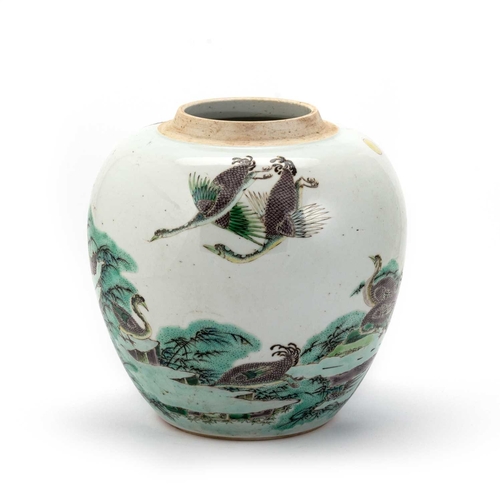 139 - A CHINESE FAMILLE VERTE GINGER JAR the large ovoid body painted with geese, bears double rings on th... 