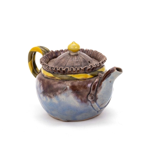 178 - A JAPANESE GLAZED EARTHENWARE TEAPOT, PROBABLY 19TH CENTURY with a 'woven' domed cover and bifurcate... 