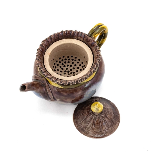 178 - A JAPANESE GLAZED EARTHENWARE TEAPOT, PROBABLY 19TH CENTURY with a 'woven' domed cover and bifurcate... 