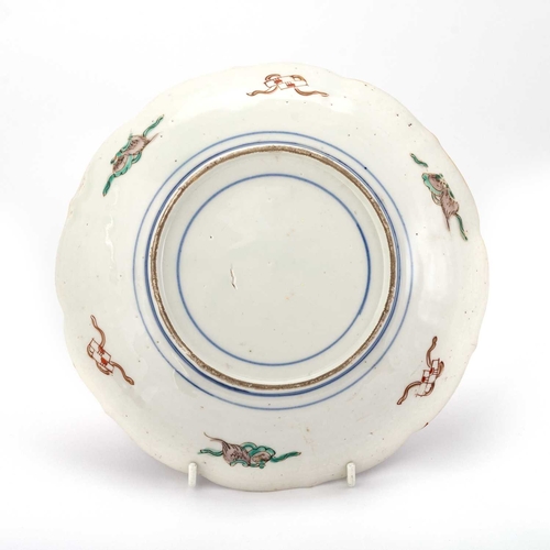 179 - A PAIR OF JAPANESE IMARI DISHES, LATE 19TH CENTURY of shaped circular form, decorated in the typical... 