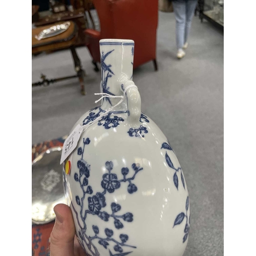 187 - A CHINESE BLUE AND WHITE MOON FLASK of oval section, painted with flower and bird compositions, the ... 