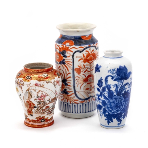 190 - THREE JAPANESE PORCELAIN VASES, 19TH CENTURY AND LATER including a Kutani iron-red vase. (3) Tallest... 