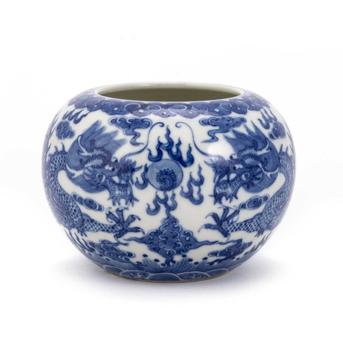 201 - A CHINESE BLUE AND WHITE 'DRAGON' CENSER squat circular form, painted with two dragons chasing a fla... 