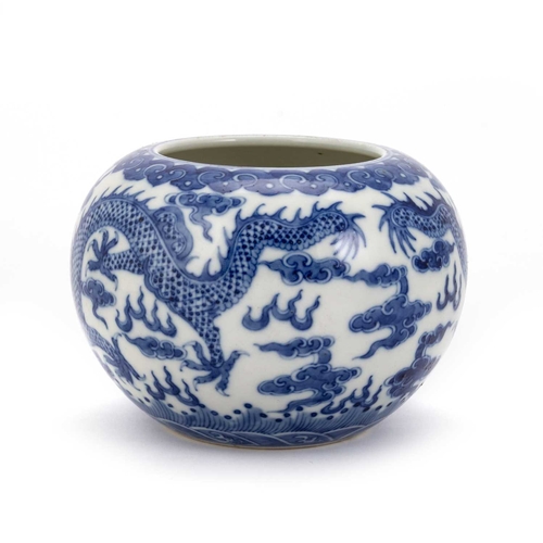 201 - A CHINESE BLUE AND WHITE 'DRAGON' CENSER squat circular form, painted with two dragons chasing a fla... 