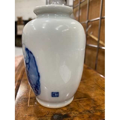 212 - TWO CHINESE BLUE AND WHITE VASES (2) Tallest 15cmThe taller vase has old chips around the rim, the s... 