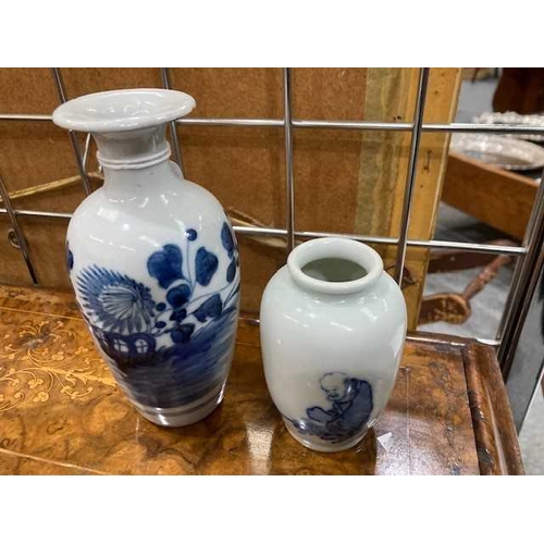 212 - TWO CHINESE BLUE AND WHITE VASES (2) Tallest 15cmThe taller vase has old chips around the rim, the s... 