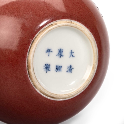 219 - A CHINESE PEACH BLOOM GLAZED WATER POT of compressed globular form, the glaze of a mottled crushed r... 