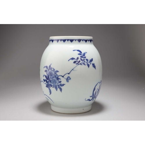 229 - A CHINESE BLUE AND WHITE TRANSITIONAL JAR, LIANZI GUAN painted with a bird seated on a branch within... 