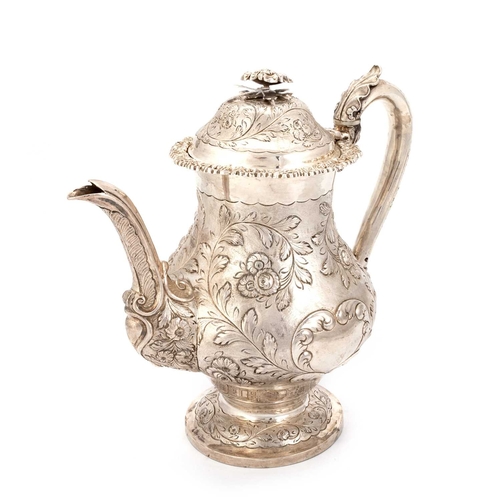 286 - § A GEORGE IV SILVER COFFEE POT by Joseph Angell I, London 1824, of baluster form, chased with flowe... 