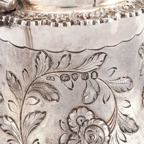 286 - § A GEORGE IV SILVER COFFEE POT by Joseph Angell I, London 1824, of baluster form, chased with flowe... 