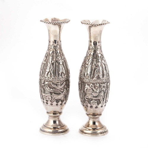 301 - A PAIR OF PERSIAN SILVER VASES each marked on the side of the base, both of slender baluster form, t... 