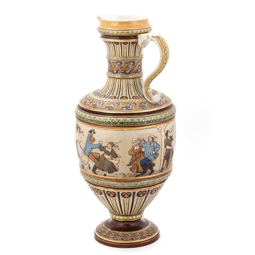 33 - A LARGE METTLACH POTTERY EWER decorated with moulded bands and with a continuing scene of Sgraffito-... 