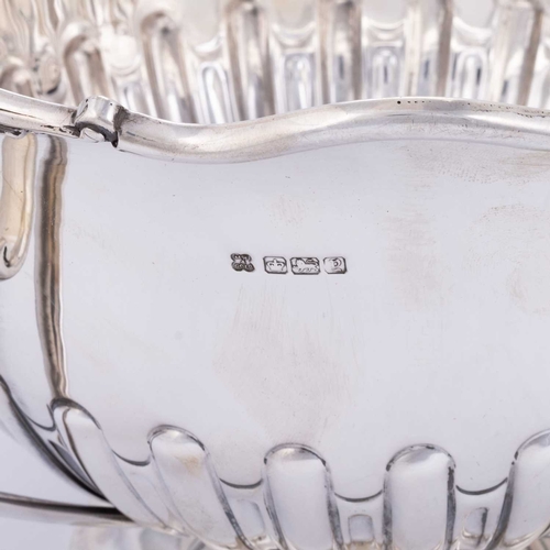 355 - A LARGE GEORGE V SILVER TWO-HANDLED BOWL by Martin, Hall & Co, Sheffield 1916, with a partially ... 