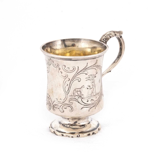 408 - AN EARLY VICTORIAN SILVER MUG by John & Henry Lias, London 1842, the waisted bowl with a leaf-ca... 