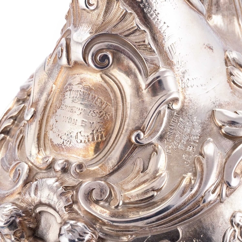 411 - A FINE VICTORIAN SILVER EWER AND STAND by John, Edward, Walter & John Barnard, London 1873, the ... 