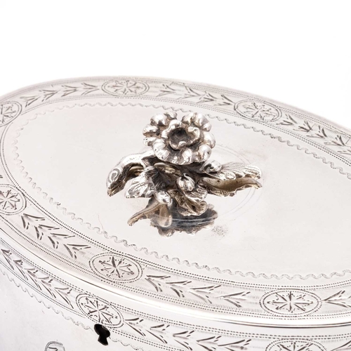 419 - A GEORGE III SILVER TEA CADDY by Charles Aldridge, London 1800, oval, with bright-cut engraved decor... 