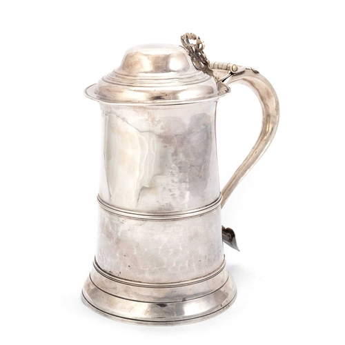 423 - A GEORGE III SILVER LIDDED TANKARD by Peter and Anne Bateman, London 1815, the stepped domed cover w... 