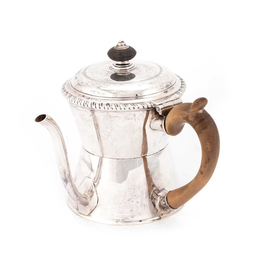 440 - A GEORGE III SILVER ARGYLE by Francis Crump, London 1774, waisted form, with a wooden scroll handle ... 