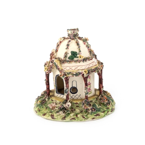 50 - A LEEDS POTTERY CREAMWARE PASTILLE BURNER of cottage form, polychrome painted, gilt and ornamented w... 