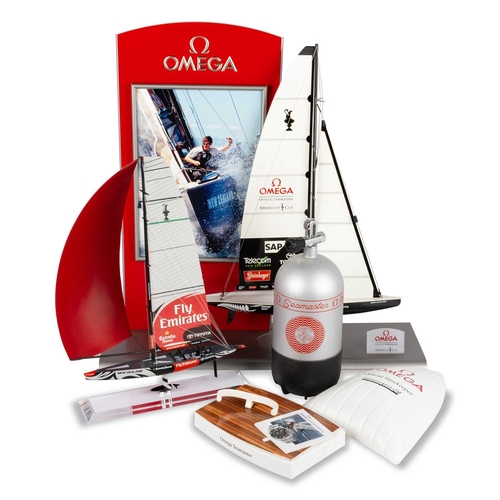 510 - AN AMERICA'S CUP OMEGA STOCKIST WATCH DISPLAY STAND comprising a large display stand; a smaller Amer... 