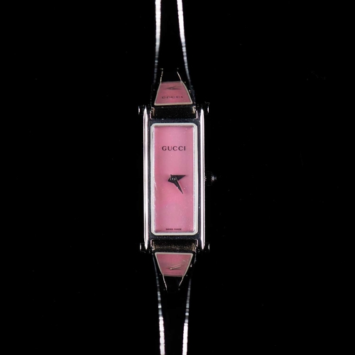 535 - A LADY'S STEEL GUCCI BANGLE WATCH rectangular pink mother of pearl dial signed Gucci, silver sword h... 