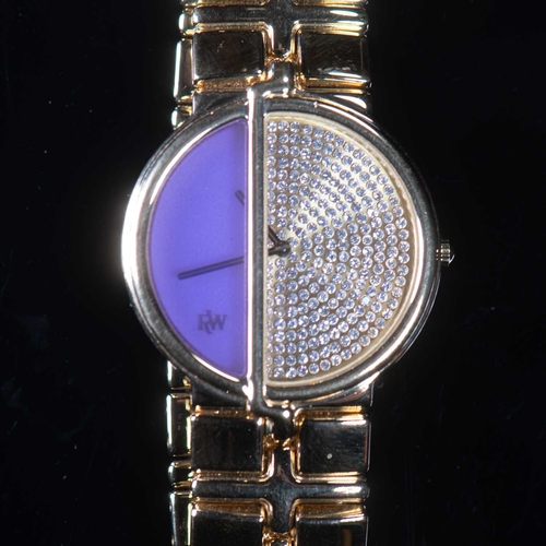 559 - AN UNWORN RAYMOND WEIL TRAVIATA BRACELET WATCH circular dial set with multiple cubic zirconia and a ... 