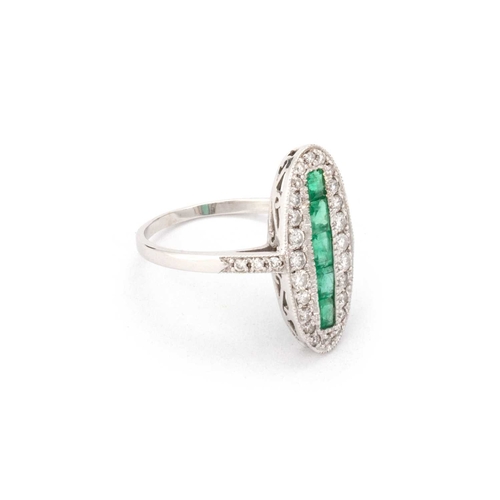 618 - AN 18 CARAT WHITE GOLD EMERALD AND DIAMOND ART DECO STYLE OVAL RING set with five square-cut emerald... 