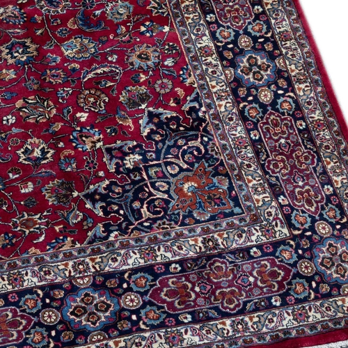 711 - A PERSIAN MASHAD CARPET 380cm by 292cm