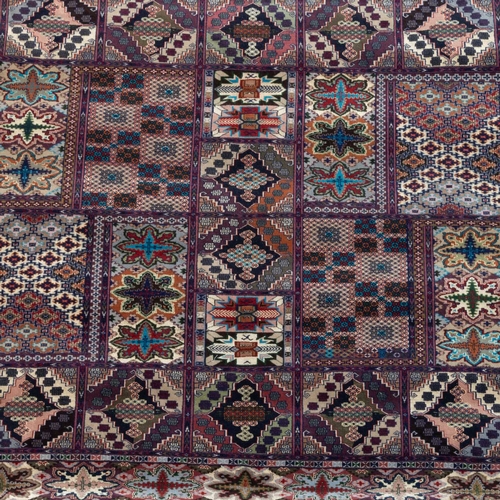 714 - A SILK AFGHAN CARPET 159cm by 117cm