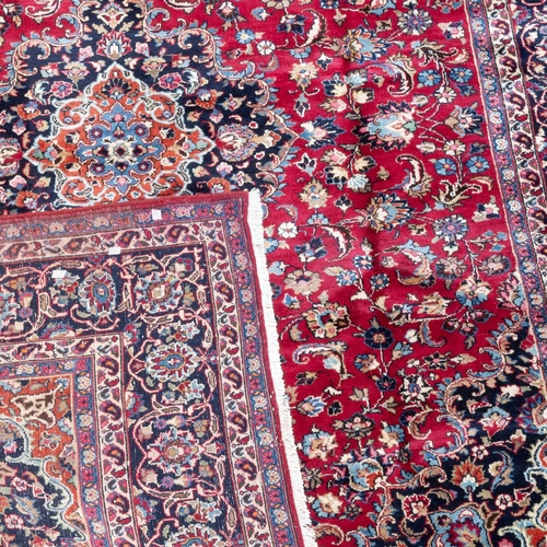 715 - A PERSIAN KASHAN CARPET 345cm by 250cm