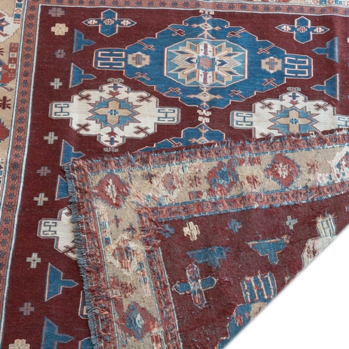 716 - AN AFGHAN SOUMAK CARPET 216cm by 186cm