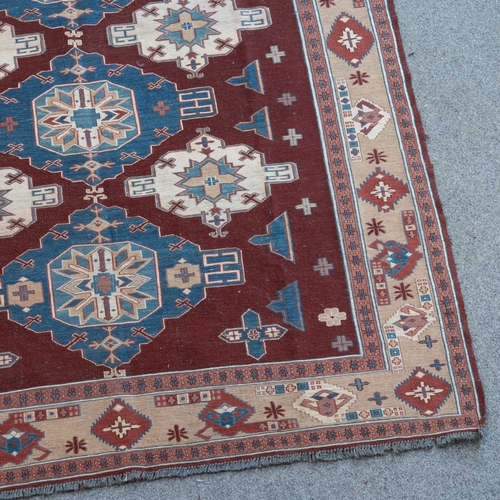 716 - AN AFGHAN SOUMAK CARPET 216cm by 186cm