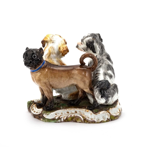 74 - A MEISSEN GROUP OF A PUG AND TWO BOLOGNESE TERRIERS, AFTER THE MODEL BY J.J. KÄNDLER, CIRCA 1860 on ... 