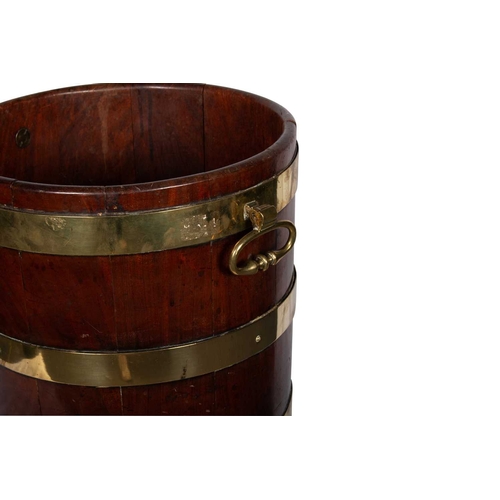 753 - A GEORGE III BRASS-BOUND COOPERED MAHOGANY BUCKET with hinged oval handles. 32.5cm high, 39cm wide o... 