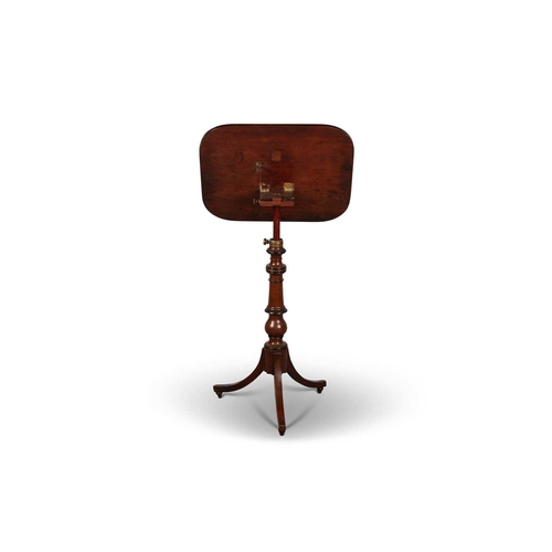 754 - A REGENCY MAHOGANY TRIPOD TABLE WITH AN ADJUSTABLE TOP the moulded rectangular top raised on a turne... 