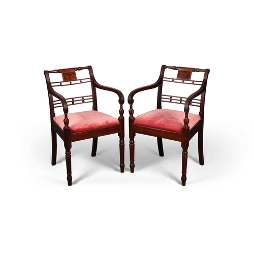 768 - A PAIR OF REGENCY ROSEWOOD CARVER ARMCHAIRS each with burr wood tablet crest and reeded downswept ar... 