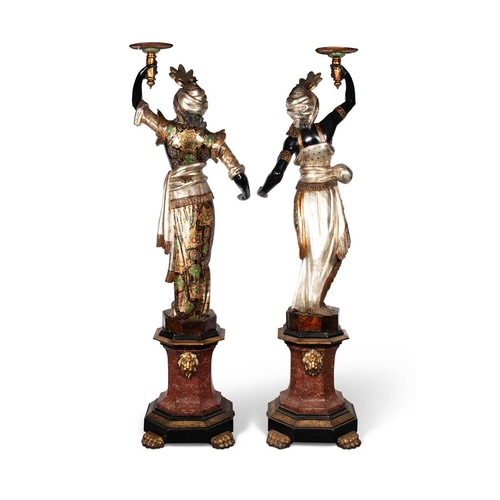 771 - A PAIR OF NORTH ITALIAN EBONISED, GILT AND POLYCHROME-DECORATED BLACKAMOOR TORCHÈRES probably Venice... 