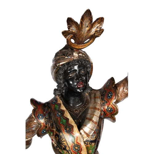 771 - A PAIR OF NORTH ITALIAN EBONISED, GILT AND POLYCHROME-DECORATED BLACKAMOOR TORCHÈRES probably Venice... 