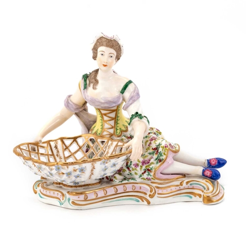 78 - A MEISSEN SWEETMEAT FIGURE modelled as a lady in 18th Century dress, underglaze blue crossed swords;... 