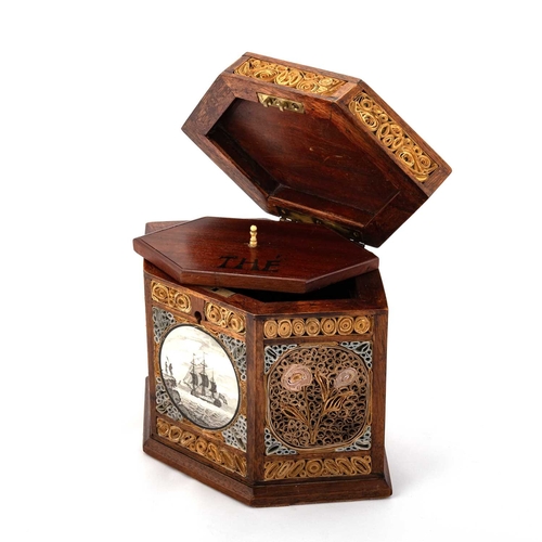 815 - A GEORGE III ROLLED PAPER SIX-SIDED TEA CADDY the hinged cover with a brass swing handle, opening to... 