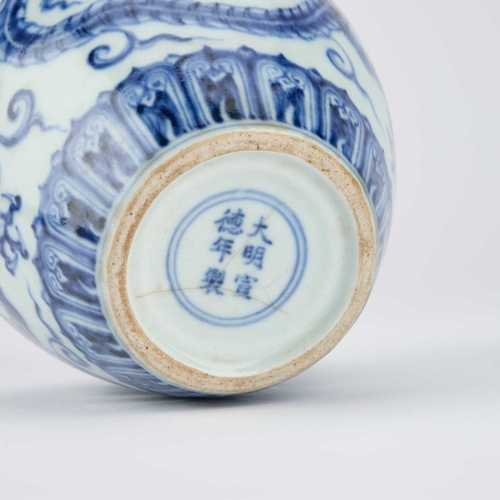 108 - A CHINESE BLUE AND WHITE 'DRAGON' JAR the tapering body underglaze blue painted with two dragons, be... 