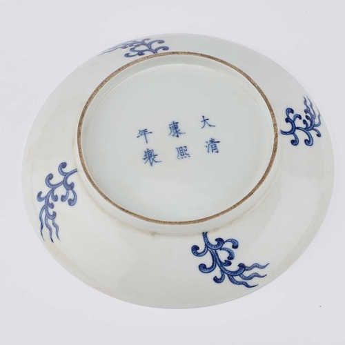 123 - A CHINESE BLUE AND WHITE 'DRAGON AND PHOENIX' DISH painted with a five-claw dragon and a phoenix sur... 