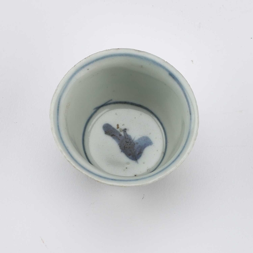 126 - A CHINESE PORCELAIN BLUE AND WHITE 'BIRDS' WINE CUP, JIAJING PERIOD thinly potted with deep flaring ... 