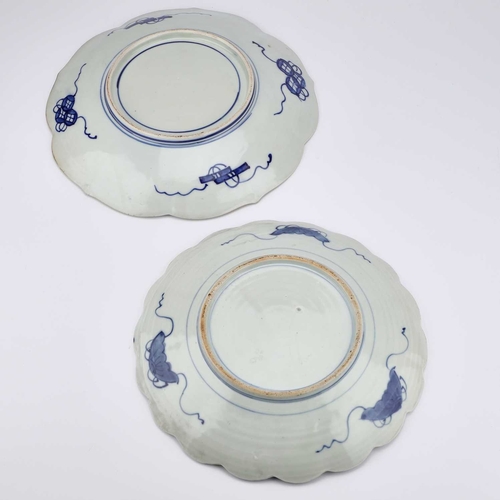 135 - TWO JAPANESE IMARI CHARGERS late 19th/ early 20th Century, of shaped circular form, decorated in the... 