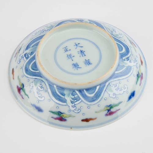 145 - A CHINESE DOUCAI 'DRAGON' SAUCER DISH painted in underglaze blue and colourfully enamelled in yellow... 