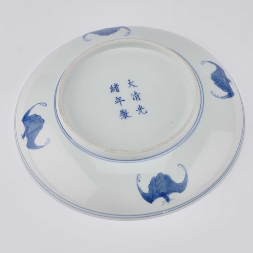 164 - A CHINESE BLUE AND WHITE 'DRAGON' DISH painted with two dragons and the flaming pearl, the underside... 