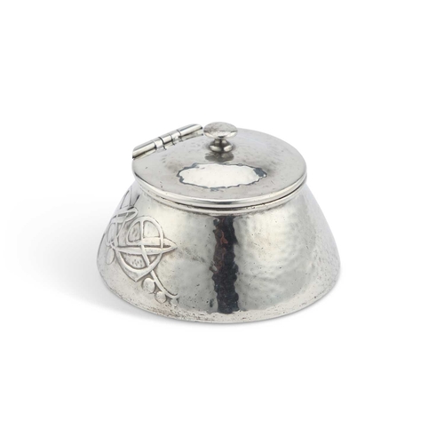 217 - ARCHIBALD KNOX (1864-1933) FOR LIBERTY & CO, A TUDRIC PEWTER INKWELL the domed hinged cover with a t... 