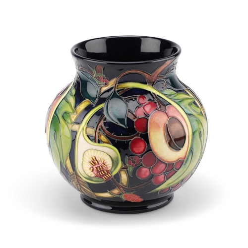 65 - A MOORCROFT POTTERY 'QUEEN'S CHOICE' VASE BY EMMA BOSSONS painted and impressed marks, in a Moorcrof... 